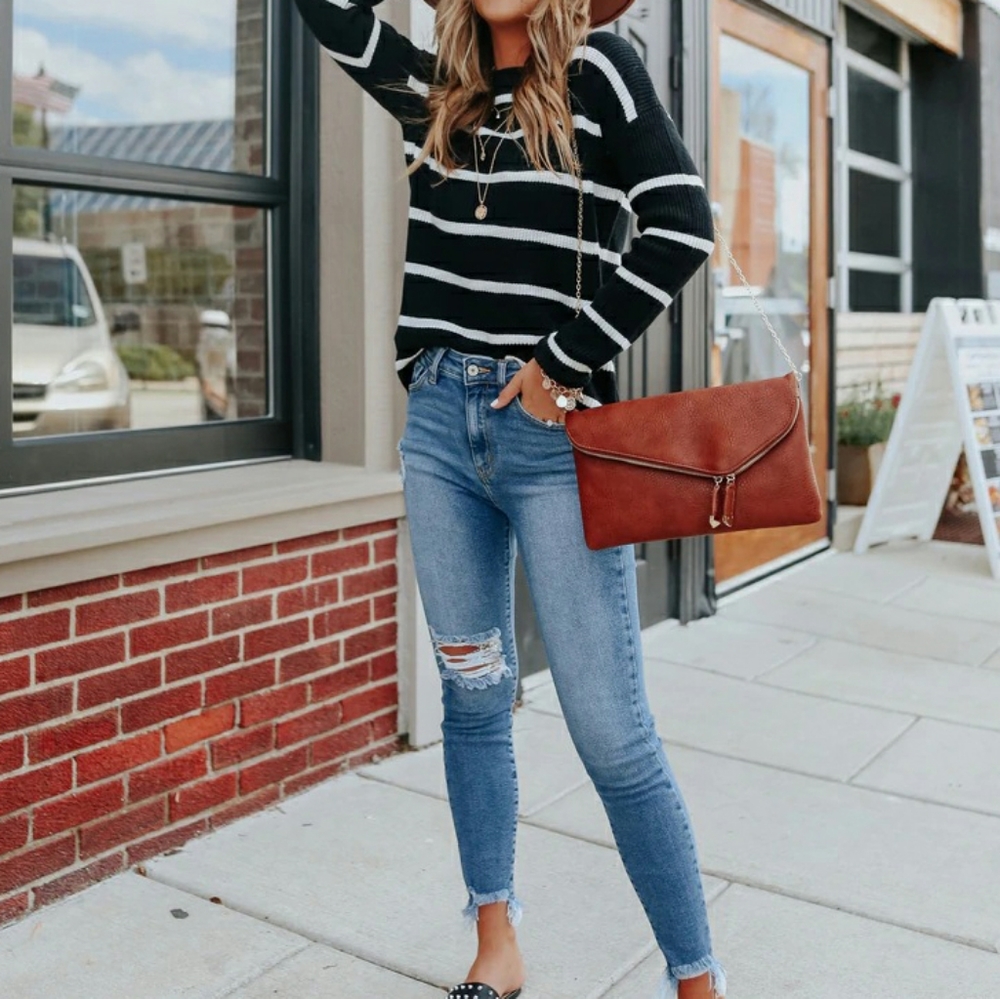 New without tags, black and white sweater
